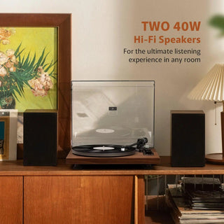 Turntable with clear dust cover and two 40W Hi-Fi speakers on a wooden cabinet