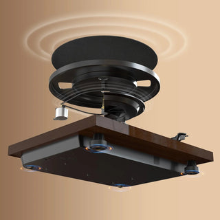 Manual belt drive turntable with wood finish and vibration isolation feet on tan background