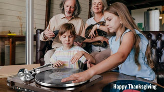 Family enjoying Thanksgiving together with vinyl record player in cozy living room